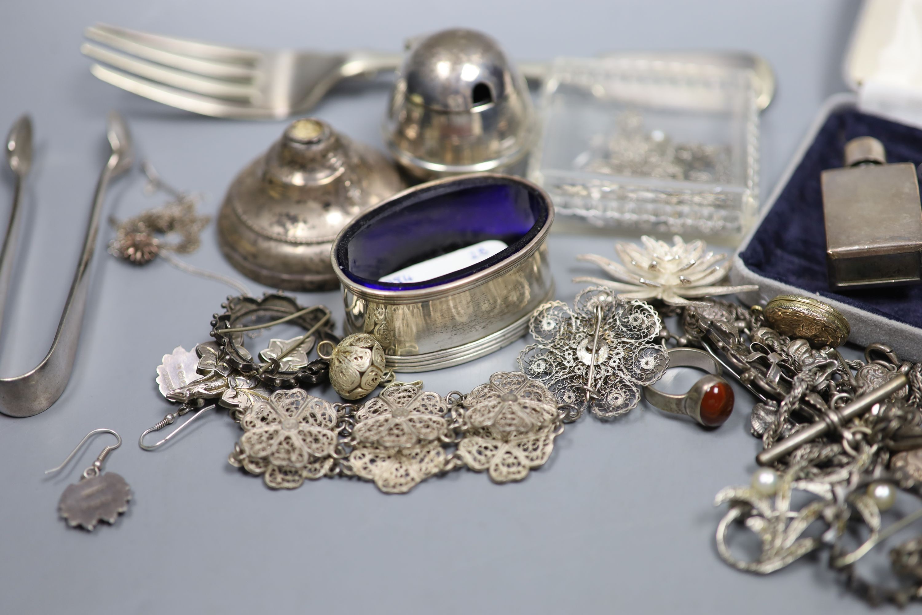 A group of assorted silver, white metal and plated items including jewellery and a pair of Svend Larsen miniature candelabra.